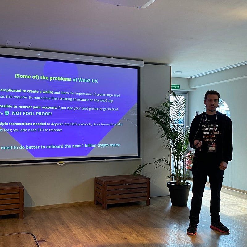 Ambire Wallet's CEO, Ivo Georgiev, in front of a projector screen
